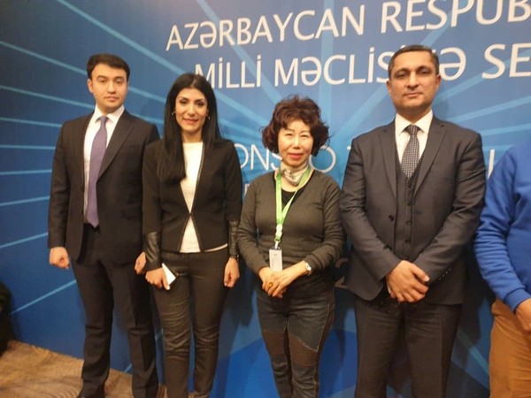 Ms. Joy Cho of The Korea Post media (third from left) with winners of the election. From left, Kamal Jafarov (Ruling party), Nigar Arpadarai (Independent), Soltan Mammadov (Independent).