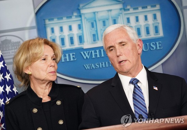 U.S. Vice President Mike Pence (right) speaking during a press briefing at the White House in Washington on March 2, 2020. White House Coronavirus Response Coordinator Ambassador Debbie Birx looks on.