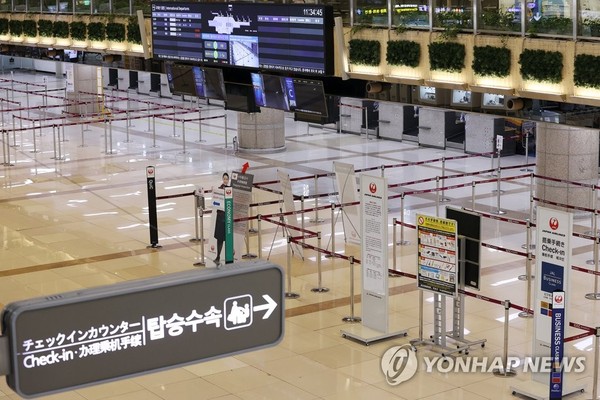an empty check-in area at Gimpo International Airport in western Seoul on March 10, 2020.