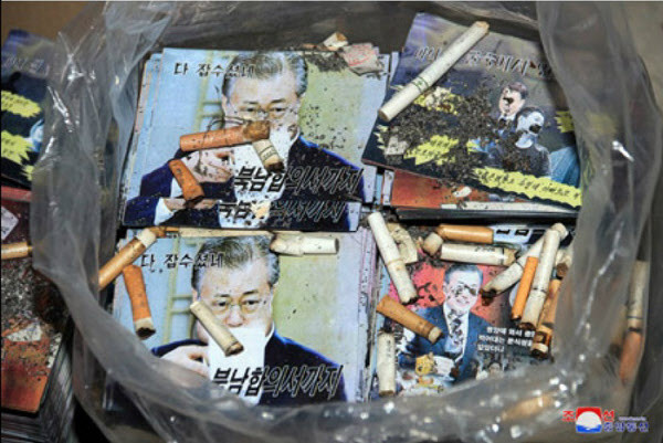 North Korean leaflets showing President Moon Jae-in dumped with cigarett buts