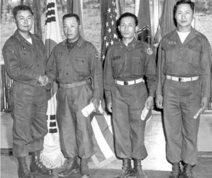 Paik Sun-yup, commander of the 1st Republic of Korea Army (far left), is seen with the then Major General Park Chung-hee (third from left). Major Gen. Park (later President of the Repulic of Korea) was rescued by Paik when Park faced charges of collaboration with Communist North Korea.