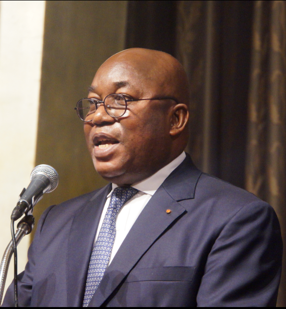 Ambassador Kouassi Bile of Cote d’Ivoire delivers a congratulatory speech to the guests.