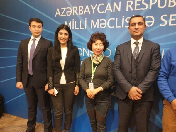 Vice Chairwoman Joy Cho of The Korea Post media (third from left) with winners of the election. From left, Kamal Jafarov (Ruling party), Nigar Arpadarai (Independent), Soltan Mammadov (Independent).
