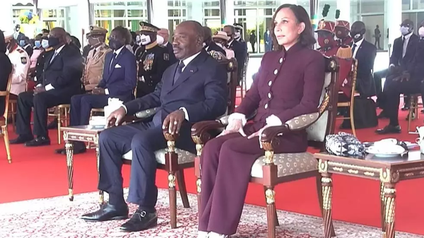 President Bongo and his wife Sylvia Bongo watch the military parade in Libreville, 17 August 2020.