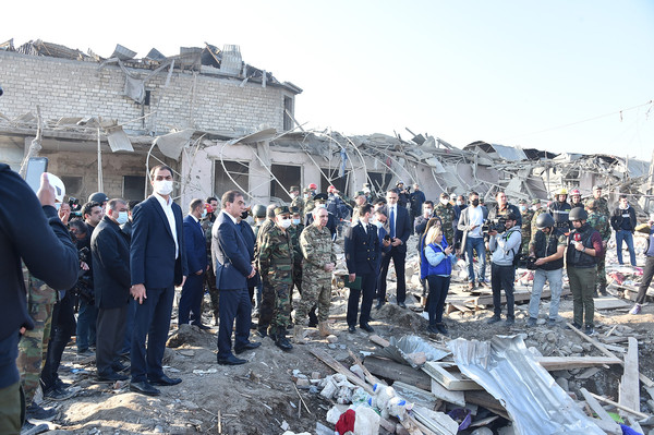 Azerbaijan government officials inspecting the damages in their country.