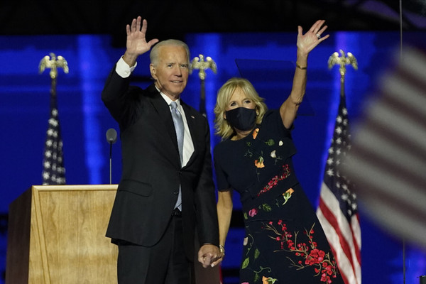 President-elect Joe Biden and his wife Jill Biden are waving to supporters on Nov. 7 in Wilmington, Del. 