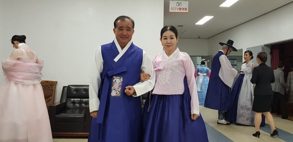Ambassador Thieng Boupha of Laos in Seoul with Madam (left and right, foreground) pose in traditional Korean Hanbok costumes.