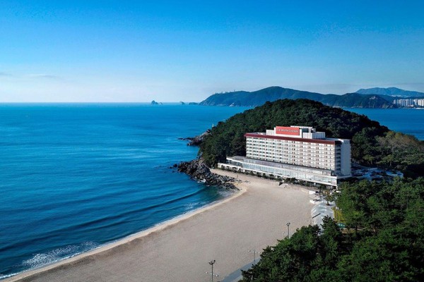 The Westin Chosun Beach Hotel standing on the sandy beach of Haeundae District in Busan.