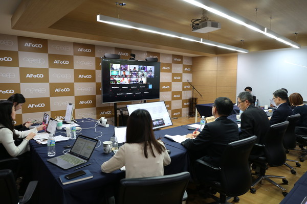 Secretariat staffs attend the video conference of the 4th session of the AFoCO General Assembly held on Nov. 25-26, 2020.