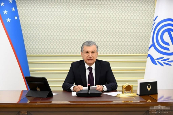 President Shavkat Mirziyoyev of Uzbekistan speaks at the 14th Summit of the Economic Cooperation Organization via videoconference.