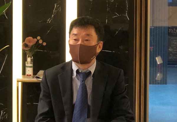 "I will communicate with the world with a mask," said Suk Hogil, Chairman of Korea Mask Industry Association.