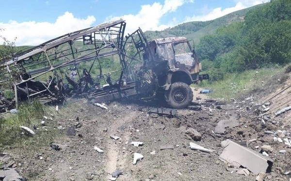 A cargo truck destroyed in an attack