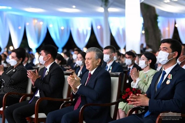 President Mirziyoyev of Uzbekistan (third from left, front row) attends Youth and Students Forum.