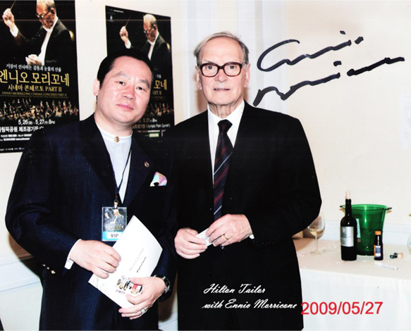 Chairman Hilton Lee (left) meets with Ennio Morricone, a world-famous Italian composer.
