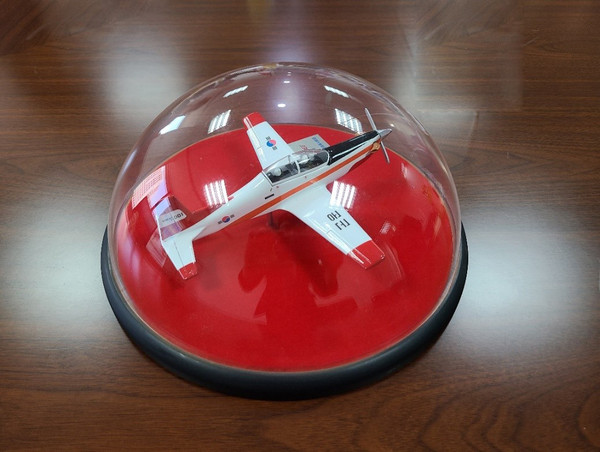 A miniature of Korean-made training aircraft shown at the Embassy of Peru in Seoul.