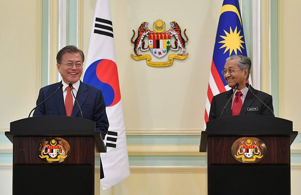 President Moon Jae-in (left) and Prime Minister Tun Dr Mahathir Mohamad of Malaysia during a press conference at Perdana Putra, Malaysia on March 13, 2019.