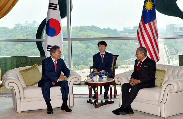 President Moon Jae-in of South Korea (left) with Prime Minister Tun Dr Mahathir Mohamad (right) of Malaysia at Perdana Putra on March 13, 2019.