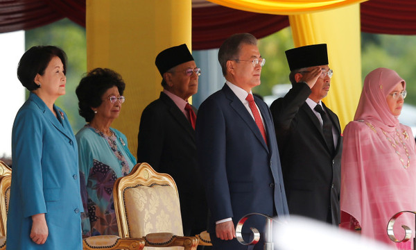 President Moon Jae-in of South Korea (third from right) with Prime Minister Tun Dr Mahathir Mohamad (third from left) and Malaysia's Sultan Abdullah of Pahang (second from right) during the welcoming ceremony held at the parliament in Kuala Lumpur, Malaysia on March 13, 2019.
