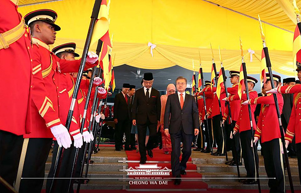 President Moon Jae-in of South Korea (right) with Malaysia's Sultan Abdullah of Pahang (left) on March 13, 2019.