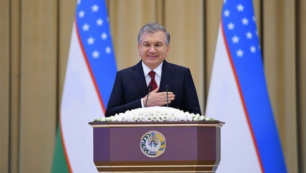 President Shavkat Mirziyoyev of Uzbekistan takes an oath for the country and the peoplebefore delivering a speech in Tashkent.