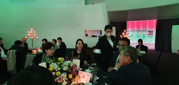 Ambassador Ramzi Teimurov of Azerbaijan and Mrs. Konul Teymurova (seated second and third from right) speak with Korean guests.