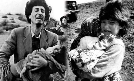 Azerbaijani girl holding her sister  after fleeing the massacre of ethnic Azerbaijanis by Armenians in the town  of Khojaly, February 1992.