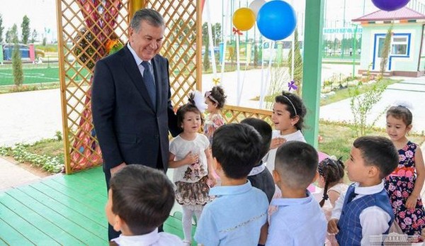 Uzbekistan also pays special attention to preschool education. President Shavkat Mirziyoyev with kindergarteners.