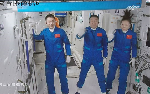 Chinese astronauts onboard the country’s Shenzhou-13 crewed spaceship successfully enter the Tianhe core module of the Tiangong space station, Oct. 23, 2021. (Photo by Tian Dingyu)