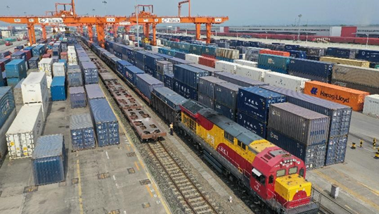 The first China-Europe freight train for cross-border e-commerce B2B exports of Chengdu, southwest China's Sichuan province departs from the city on June 18, 2021. The train carries 50 containers of high-valued commodities that worth nearly 30 million yuan, such as hardware appliances and auto diagnostic apparatuses. It takes about 12 days for the train to arrive at its destination in Malaszewicze, Poland, which is more than 8,000 kilometers away, and in three more days, the commodities will be delivered to the buyers. (Photo by Bai Guibin/People's Daily Online)