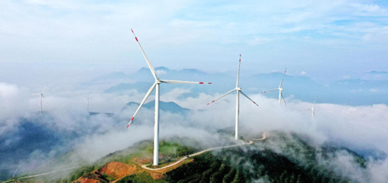 Wind turbines rotate at an altitude of over 1,000 meters in Xianju county, Taizhou city, east China’s Zhejiang province, August 26, 2021. (Photo by Wang Huabin/People’s Daily Online)