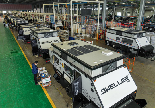 Recreational vehicles are being manufactured at a plant in Rongcheng, east China's Shandong province, March 22, 2022. (Photo by Li Xinjun/People's Daily Online)