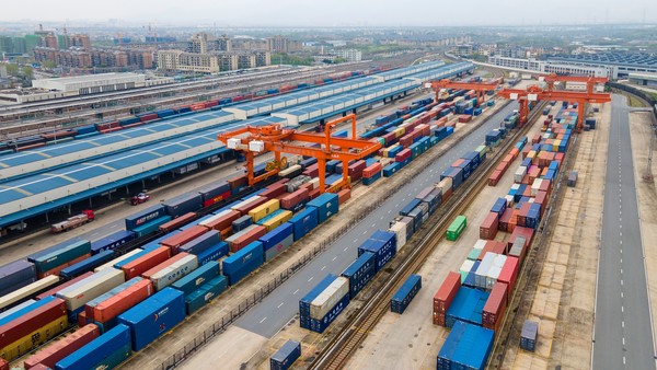 Aerial photo taken on March 28, 2022, shows cranes are carrying out container loading operations orderly in Jinhua city, east China’s Zhejiang province. (Photo by Hu Xiaofei/People’s Daily Online)