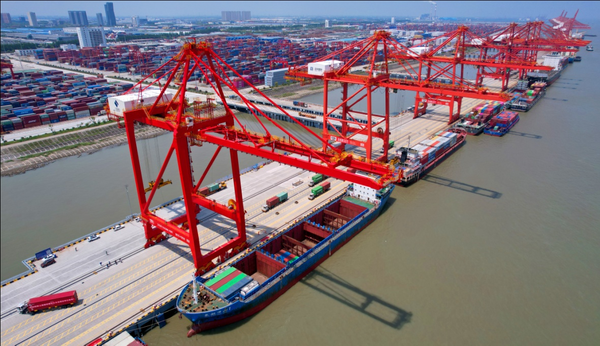 A cargo ship from Shanghai is berthed at a container wharf of Taicang Port, east China’s Jiangsu province, May 7, 2022. (Photo by Ji Haixin/People’s Daily Online)