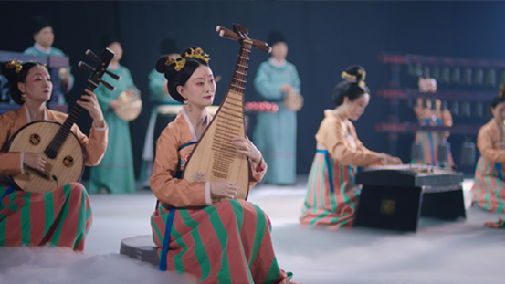 Members of Huaxia Ancient Music Orchestra of Henan Museum, an orchestra that performs ancient Chinese music, are playing music with traditional Chinese instruments. (Photo/Courtesy of the Culture and Tourism Department of Henan Province)
