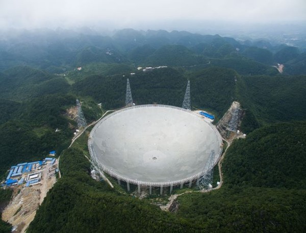 Photo shows China’s Five-hundred-meter Aperture Spherical radio Telescope (FAST), world’s largest single-dish radio telescope, located in Pingtang county, Qiannan Buyi and Miao autonomous prefecture, southwest China’s Guizhou province. (Photo by Deng Gang/People’s Daily Online)