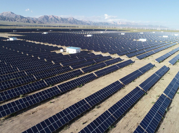 Photo taken on July 24, 2018 shows a photovoltaic (PV) power station in a photovoltaic industrial park in Delingha, Haixi Mongolian and Tibetan autonomous prefecture, northwest China's Qinghai province. (Photo by Wang Zheng/People's Daily Online)
