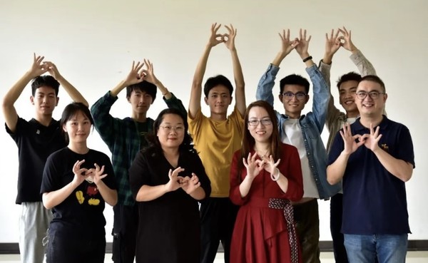 Photo shows members of the R&D team that developed the real-time translation system for sign language from Tianjin University of Technology. (Photo courtesy of the Technical College for the Deaf, Tianjin University of Technology)