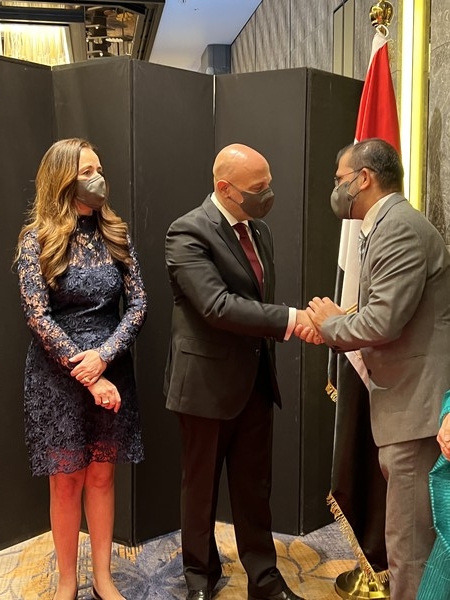 Ambassador Khaled Abdel Rahman of the Egypt (center) welcomes incoming guests at the Four Seasons Hotel in Seoul with Madam Rahman (left).