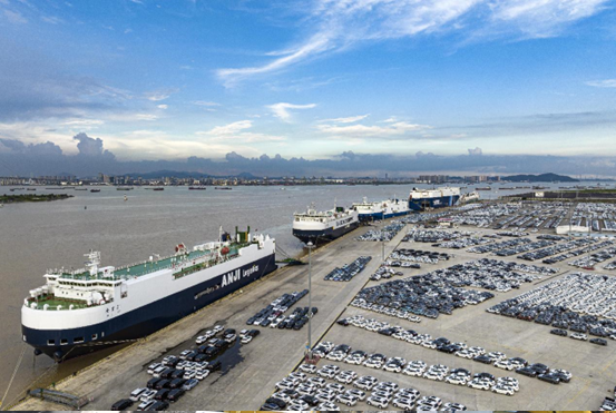 Automobiles are parked at a terminal in Nansha district, Guangzhou, south China’s Guangdong province, waiting to be loaded onto roll-on/roll-off ships for exportation, July 8, 2022. (Photo by Wei Jinsong/People’s Daily Online)