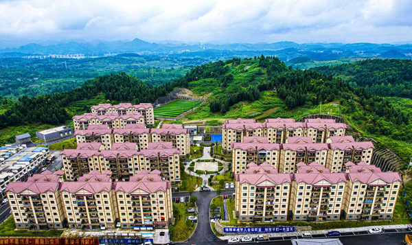 Photo taken on July 3, 2022 shows a poverty-alleviation resettlement site in Wenfeng neighborhood, Qianxi, southwest China's Guizhou province. (Photo by Zhou Xunchao/People's Daily Online)