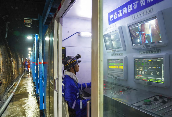A mine worker works in a smart monitoring room in a coal shaft 600 meters under the ground in a coalfield in north China's Inner Mongolia autonomous region, June 20, 2019. (Photo by Yuan Hong/People's Daily Online)