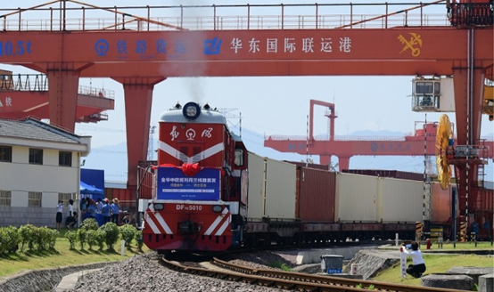 The first China-Europe freight train from east China's Zhejiang province to the Netherlands departs from Jinhua, Zhejiang, carrying 100 twenty-foot equivalent units, July 2022. (Photo by Shi Bufa/People's Daily Online)
