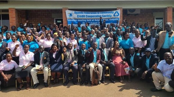 Representatives of community credit cooperatives in Uganda take a commemorative photo after holding a meeting to establish Uganda Federation of Community Credit Cooperative Society.