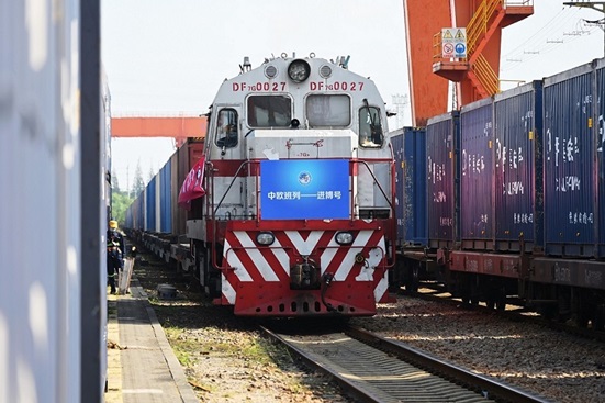 A "Jinbo" China-Europe freight train arrives at a Shanghai train station from Hamburg, Germany, Oct. 29, 2021. (Photo by Shen Chunchen/People's Daily Online)