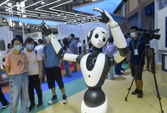 A robot dances at the World Digital Economy Conference 2022 and the 12th Smart City and Intelligent Economy Expo in Ningbo, east China's Zhejiang province, Sept. 2, 2022. (Photo by Hu Xuejun/People's Daily Online)