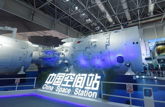 A model of China's space station combination is displayed at the 14th China International Aviation and Aerospace Exhibition in Zhuhai, south China's Guangdong province, Nov. 9, 2022. (Photo by Long Wei/People's Daily Online)