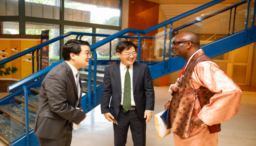(From left) Bahng Kyungwon, Political Counselor/Deputy Chief of Mission Korean Embassy Nigeria, Director of Korea Cultural Centre Nigeria and Yuccee Uwah, Korea Post Nigeria Bureau Chief greet each other ar the Korean National Day 2022 event held at Hilton Hotel, Abuja, Nigeria.