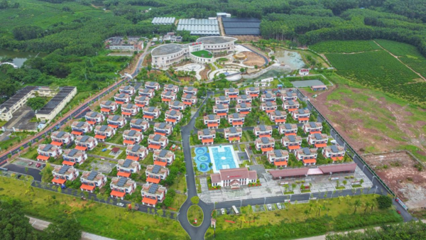 Photo taken on Sept. 21, 2022 shows Xin'gaofeng village in Baisha Li autonomous county, south China's Hainan province. It is one of the first villages to implement the ecological relocation for the construction of the Hainan Tropical Rainforest National Park. (Photo by Sun Shijie/People's Daily Online)