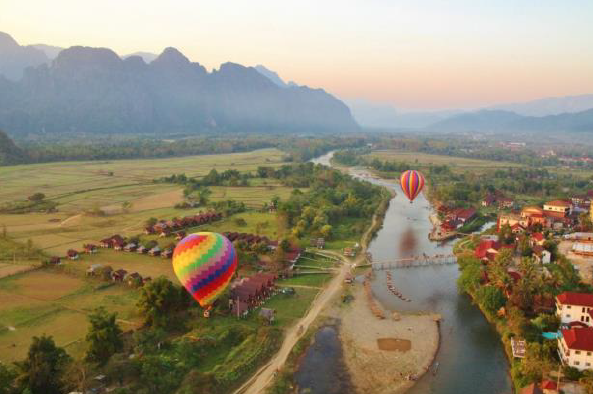 Vang Vieng, located 150 kilometers from Vientiane, is a tiny city surrounded by rivers and mountains, making it one of the most attractive sites in Laos.
