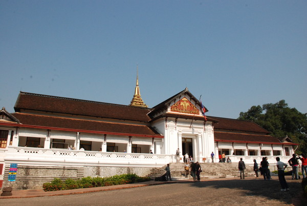 The Royal Palace Museum, located in the centre of Luang Prabang, was built during the French colonial era in 1904. See the original "Prabang" Buddha image at the museum. The former queen lives in a small chamber surrounded by engraved elephant ivory and three silk screens embroidered by her. To discover it, walk east along the palace's south terrace's exterior and look in between the bars at the eastern end. 